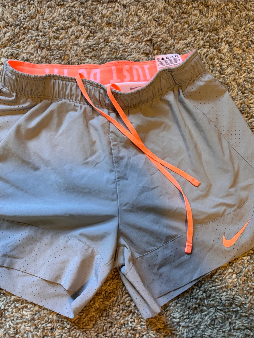 Nike Women’s Light Gray Athletic Shorts with Coral Trim